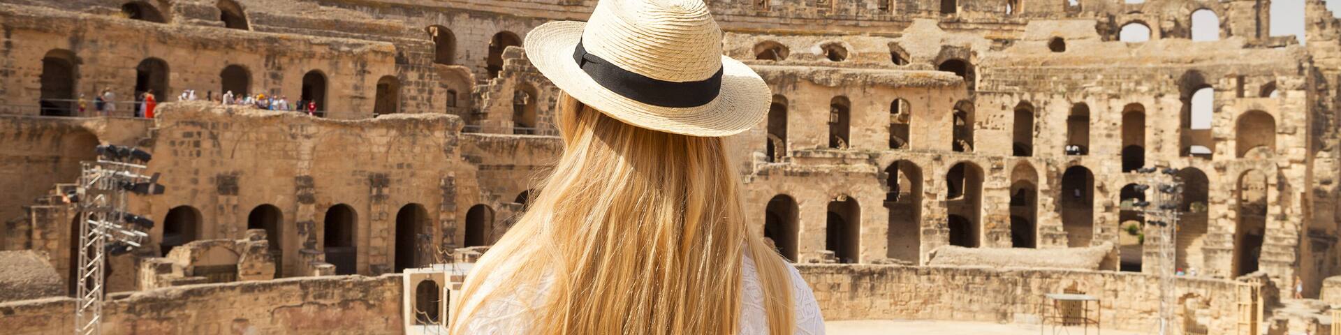 Woman in Tunisia El Jem roman apmphitheatre. Largest colosseum in in North Africa. El Jem,Tunisia. UNESCO
