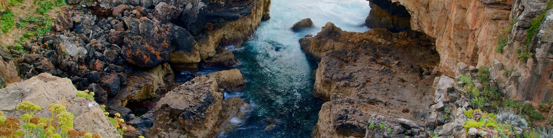 Boca do Inferno mostrando paisagens litorâneas e litoral rochoso