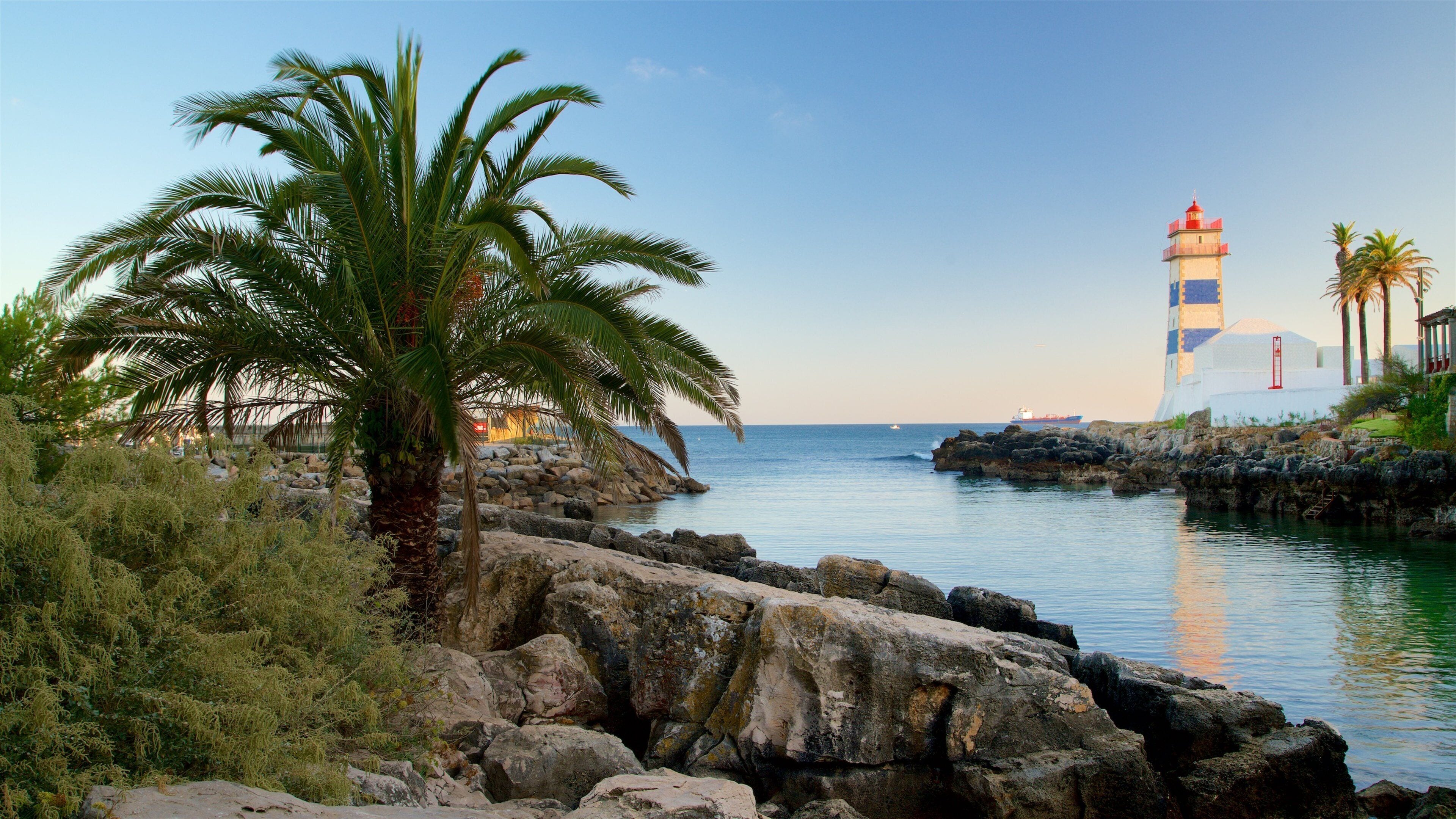 Santa Marta Lighthouse Museum which includes a lighthouse, rocky coastline and general coastal views