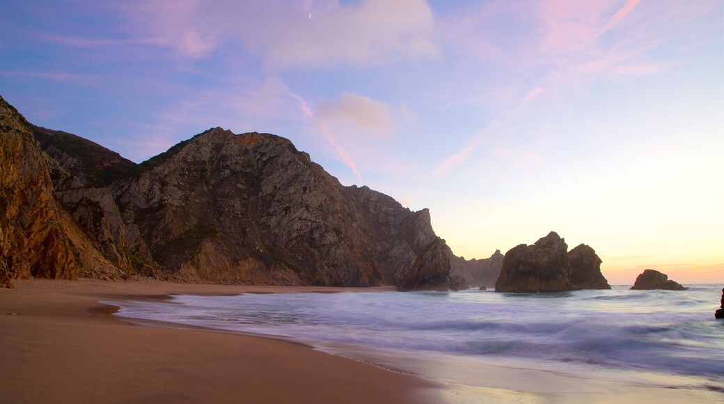 Ursa Beach featuring rugged coastline, general coastal views and a sunset