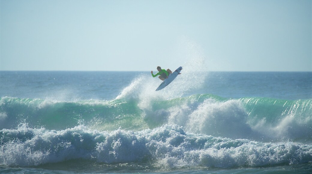 Adraga Beach showing waves, general coastal views and surfing