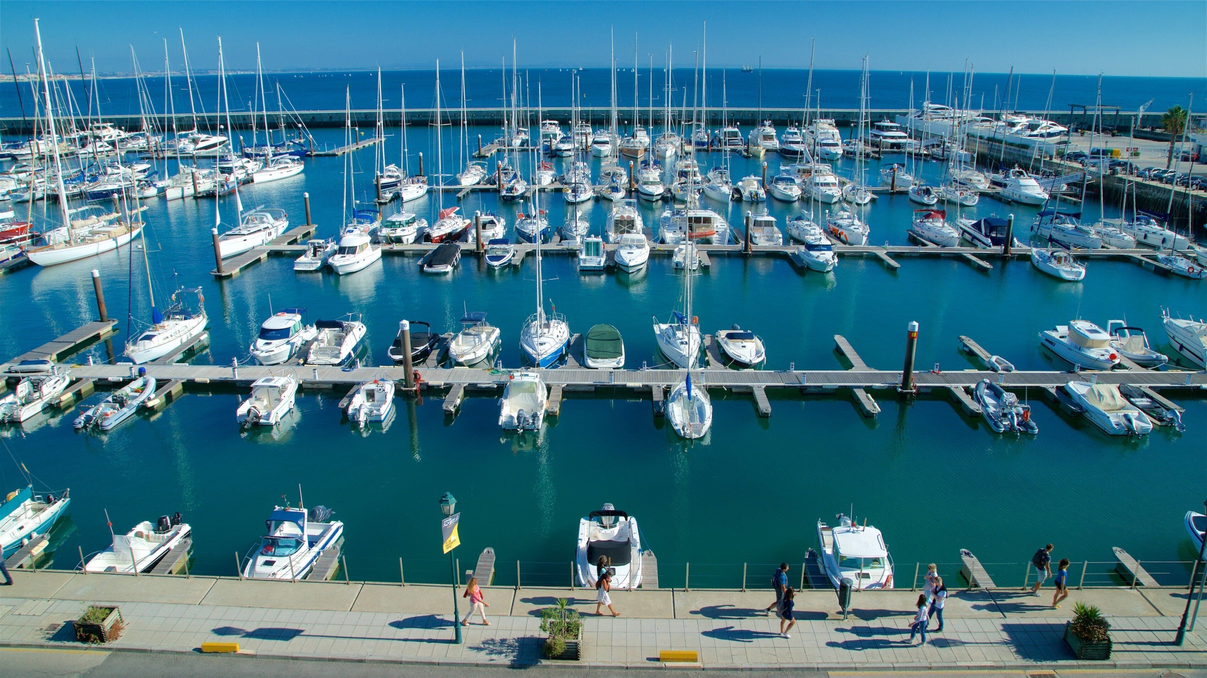 Cascais Marina which includes general coastal views and a bay or harbor