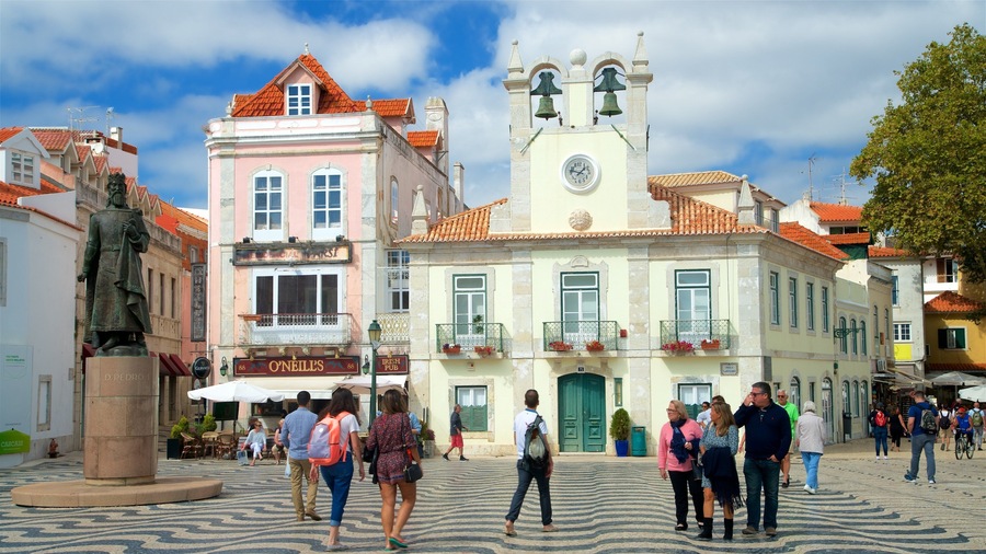 Cascais showing a square or plaza as well as a small group of people