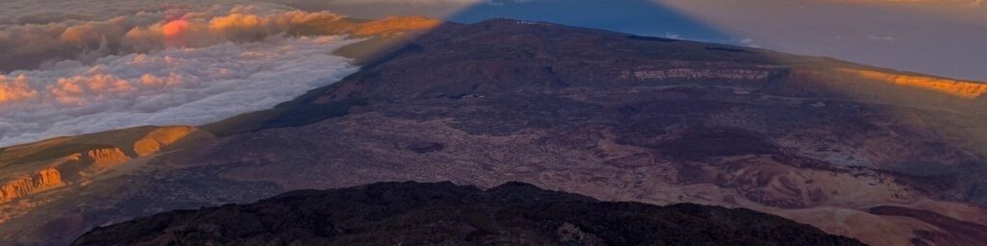 El Teide is the tallest mountain in Spain and the third tallest volcano in the world. The sub summit can be accessed via a gondola that operates between 8 and 6 on most days. From there you can hike to the summit if you have obtained a permit or after hours. From the highest point on the mountain at sunset or sunrise you can capture this stunning shadow that stretches for miles and miles out across the island and into the sea.