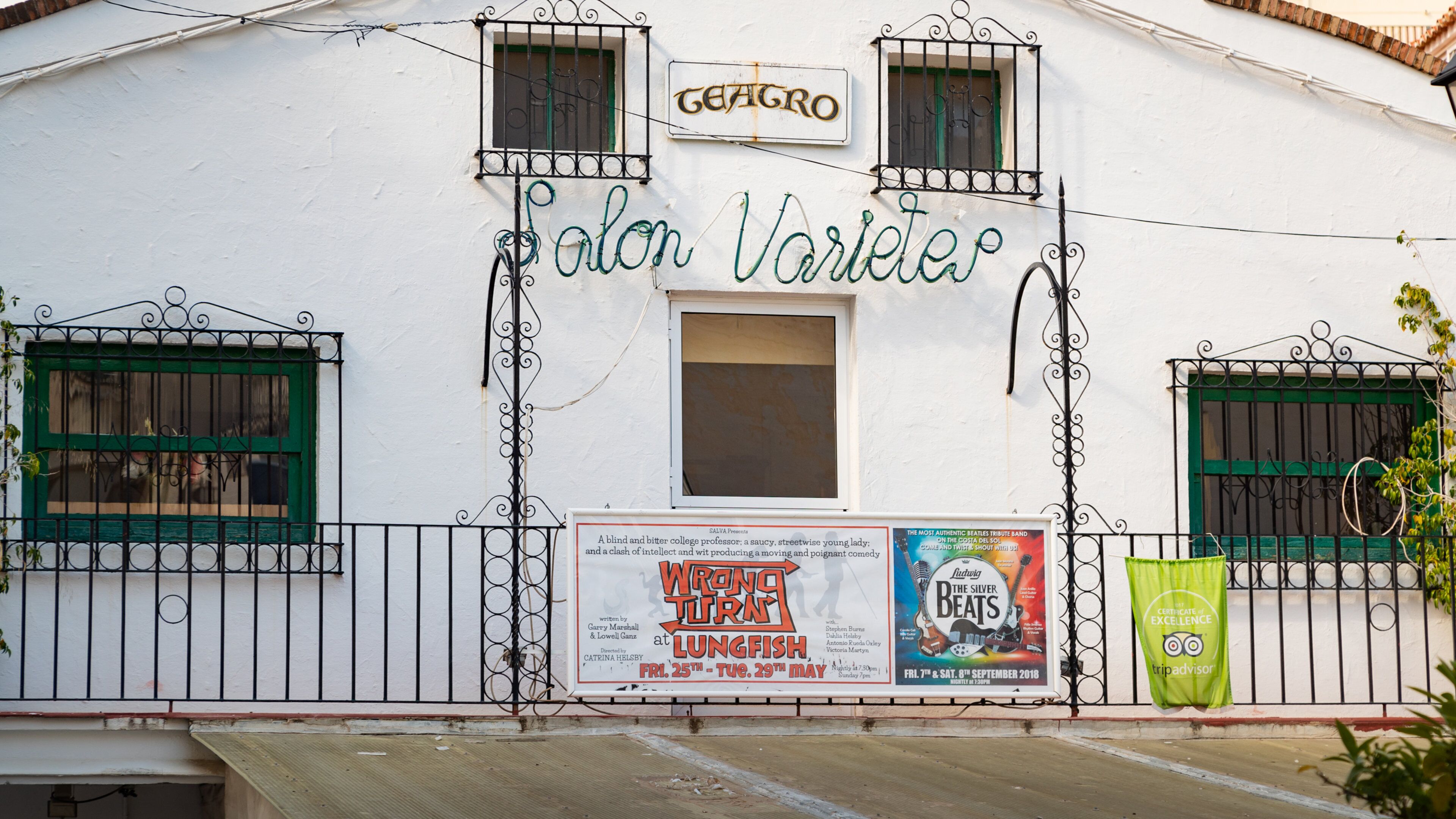 Salon Varietes Theatre which includes signage