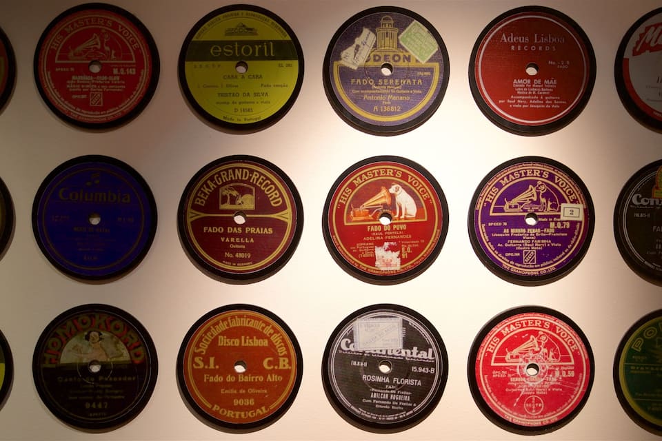 A wall of various vinyl records.