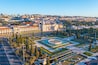 View of mosteiro dos Jeronimos through praca do imperio in Belem, Lisbon, Portugal
