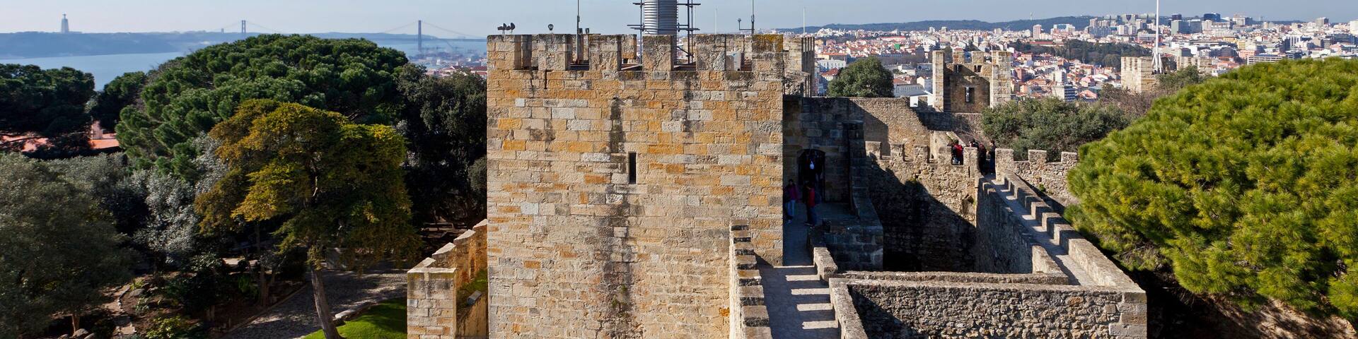 Lisbon, Portugal - February 1, 2013: Castelo de Sao Jorge aka Saint George Castle. Barbican structure on the keep entrance and the Ulysses Tower.
