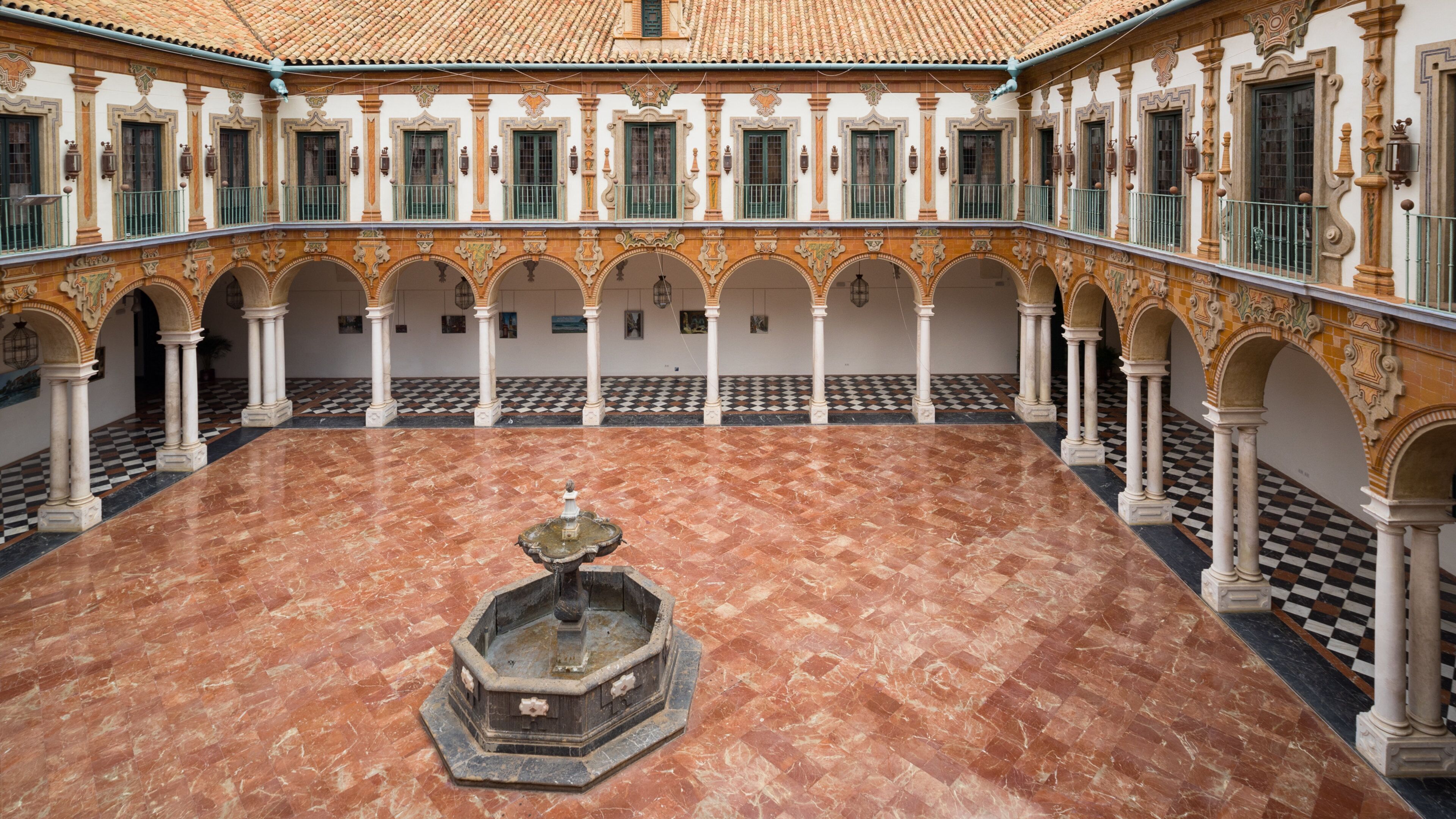 Palacio de la Merced featuring heritage elements and a fountain