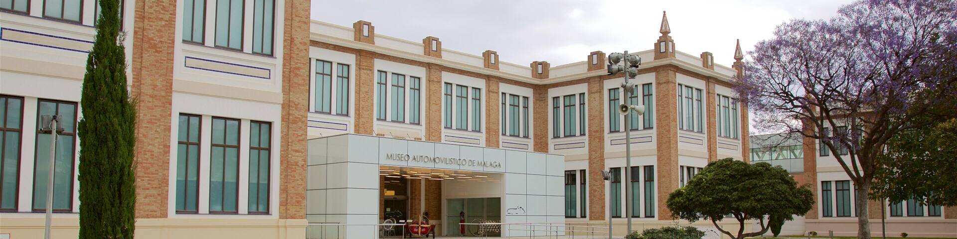 A museum building with a sign reading "Museo Automovilístico de Malaga".
