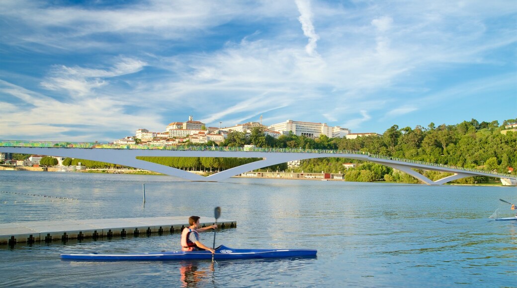 Pedro and Ines Footbridge featuring kayaking or canoeing, a river or creek and a bridge