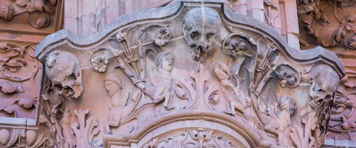 Detail of the facade of University of Salamanca in plateresque style and the famous frog on a skull.The Old city of Salamanca is declared by UNESCO a World Heritage Site.; Shutterstock ID 776009758; P