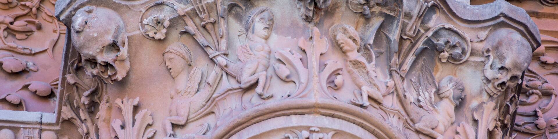 Detail of the facade of University of Salamanca in plateresque style and the famous frog on a skull.The Old city of Salamanca is declared by UNESCO a World Heritage Site.; Shutterstock ID 776009758; P