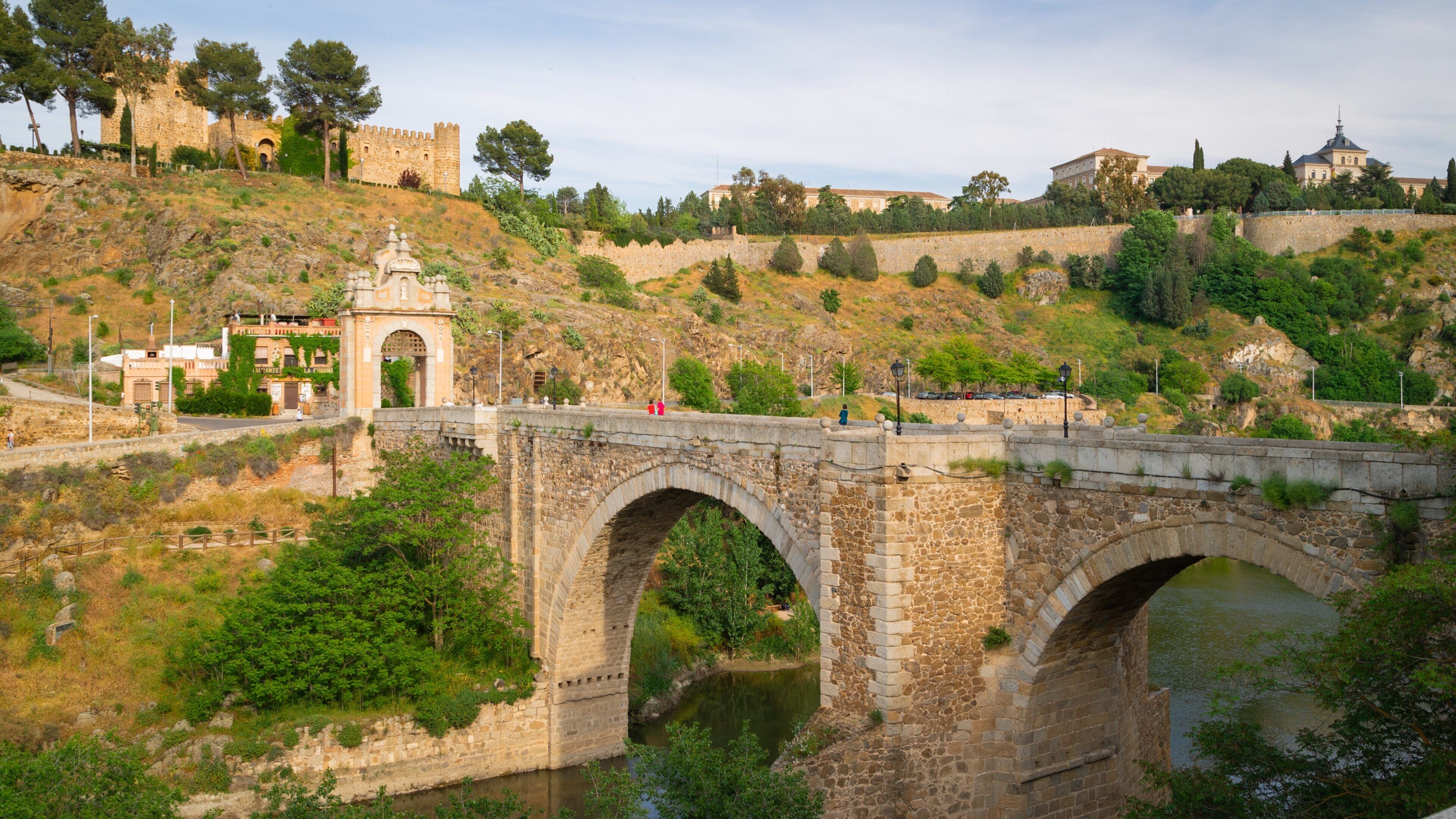 Puente de Alcantara showing landscape views, a bridge and a river or creek