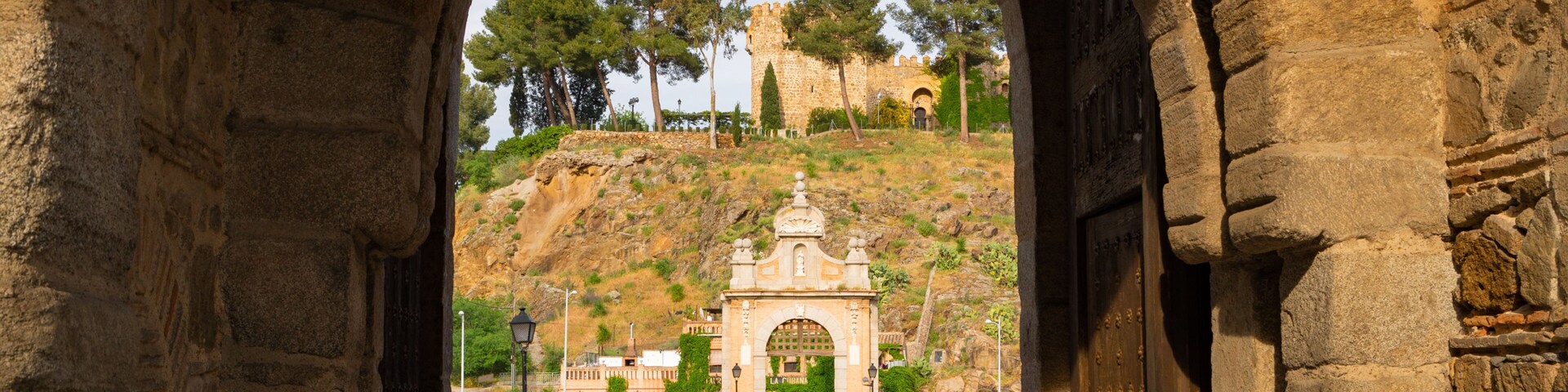 Puente de Alcantara showing heritage elements and a bridge as well as a couple