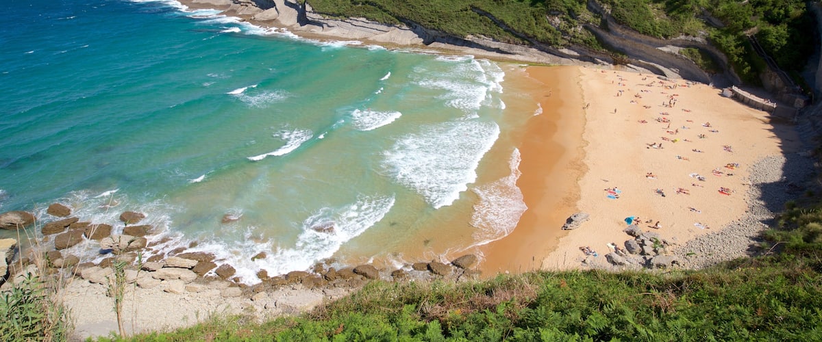 Santander showing a beach, general coastal views and rugged coastline