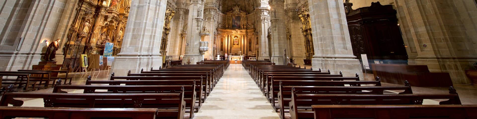 Iglesia de Santa María del Coro welches beinhaltet Innenansichten und Geschichtliches