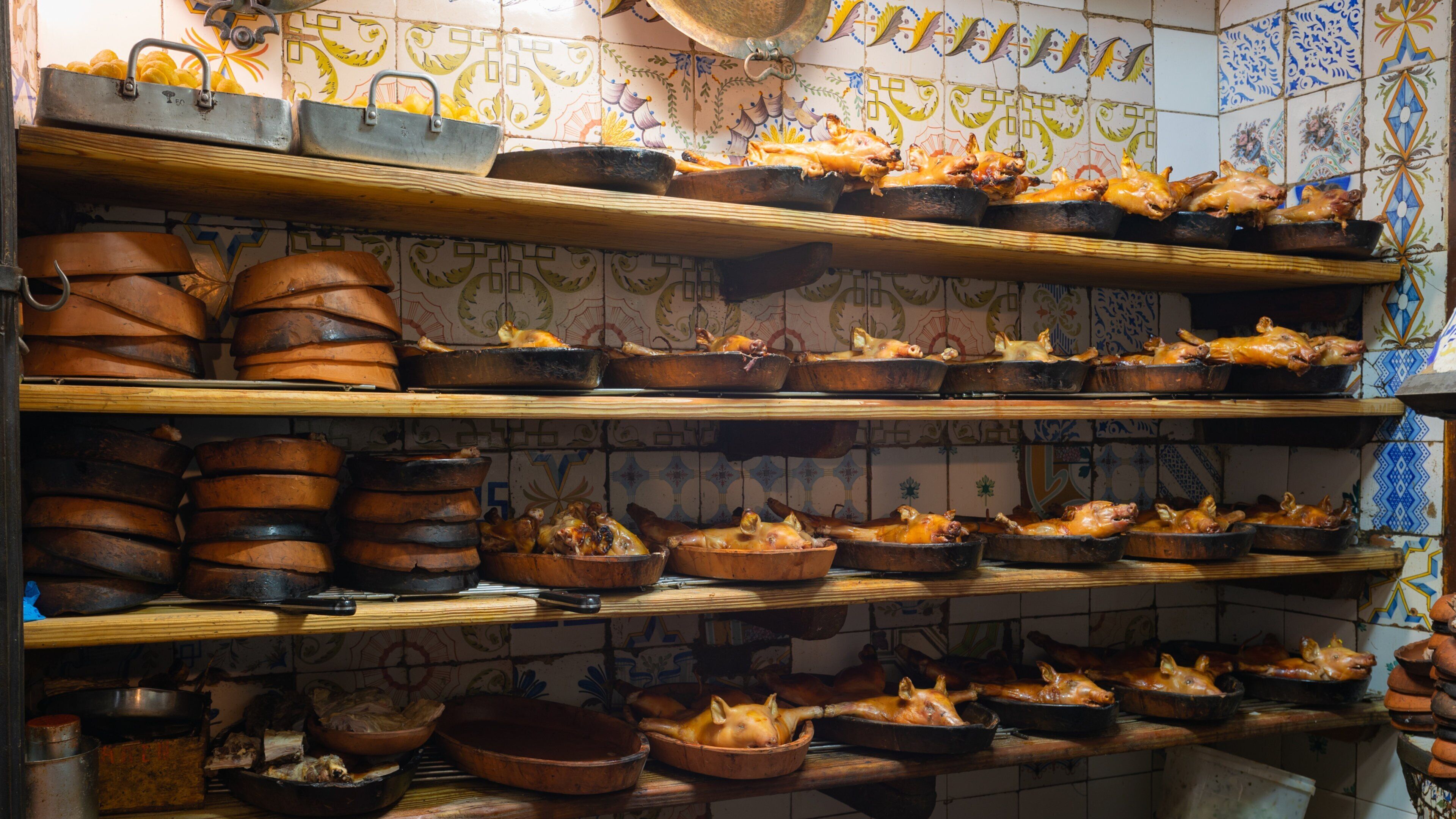 Sobrino de Botin featuring food and interior views