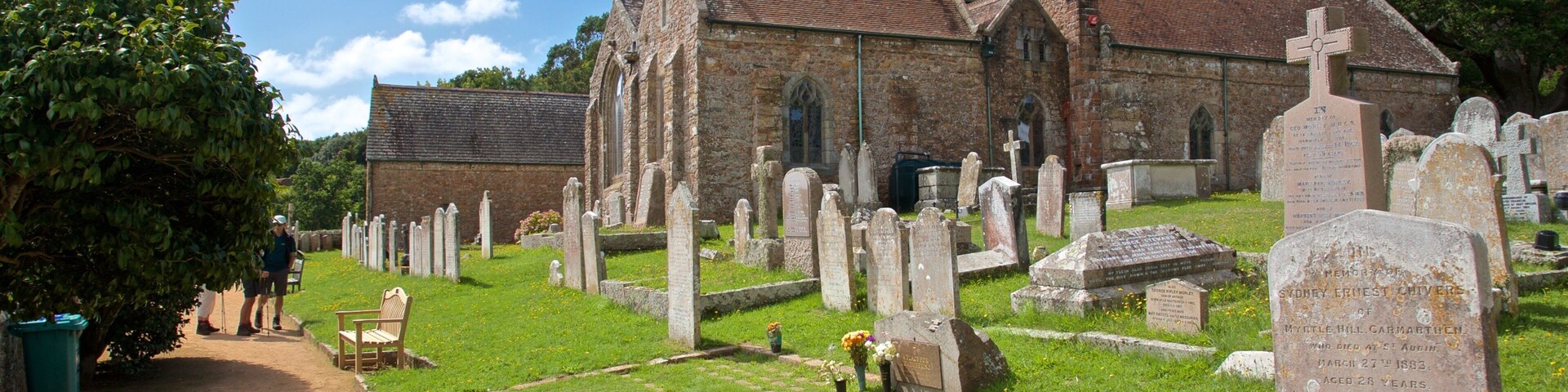 Parish Church of St. Brelade showing a church or cathedral, heritage elements and a cemetery