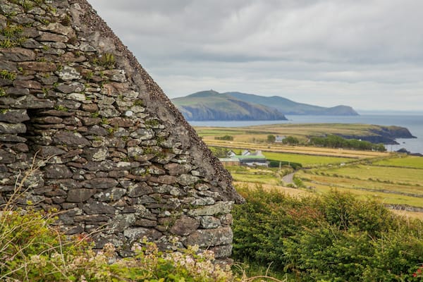 Irish Famine Cottages featuring heritage elements and general coastal views