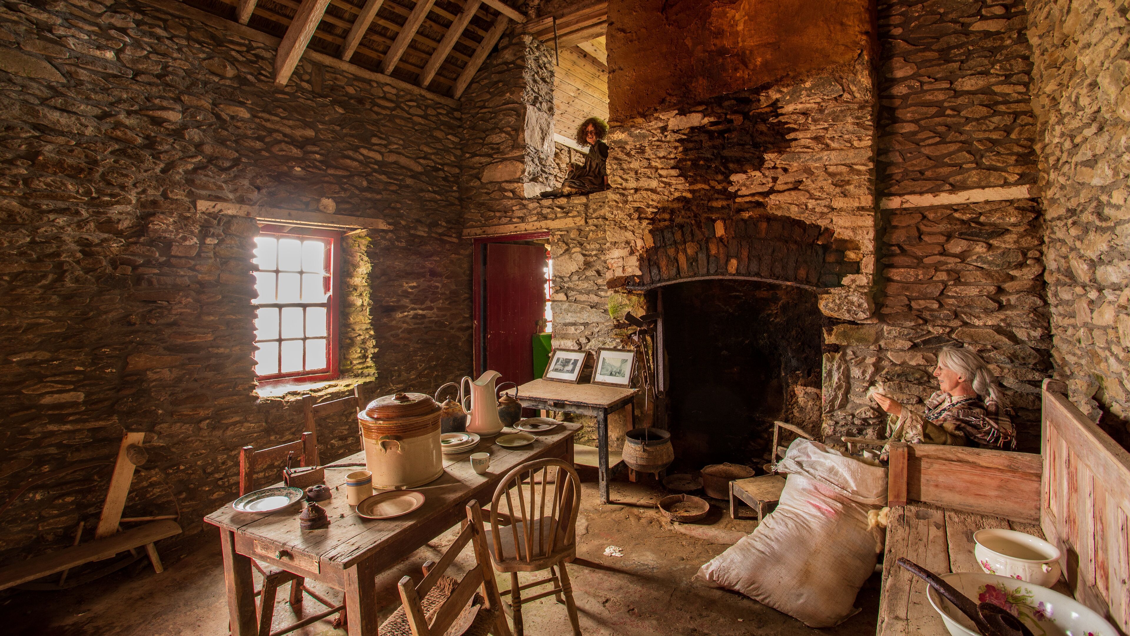 Irish Famine Cottages which includes heritage elements and interior views