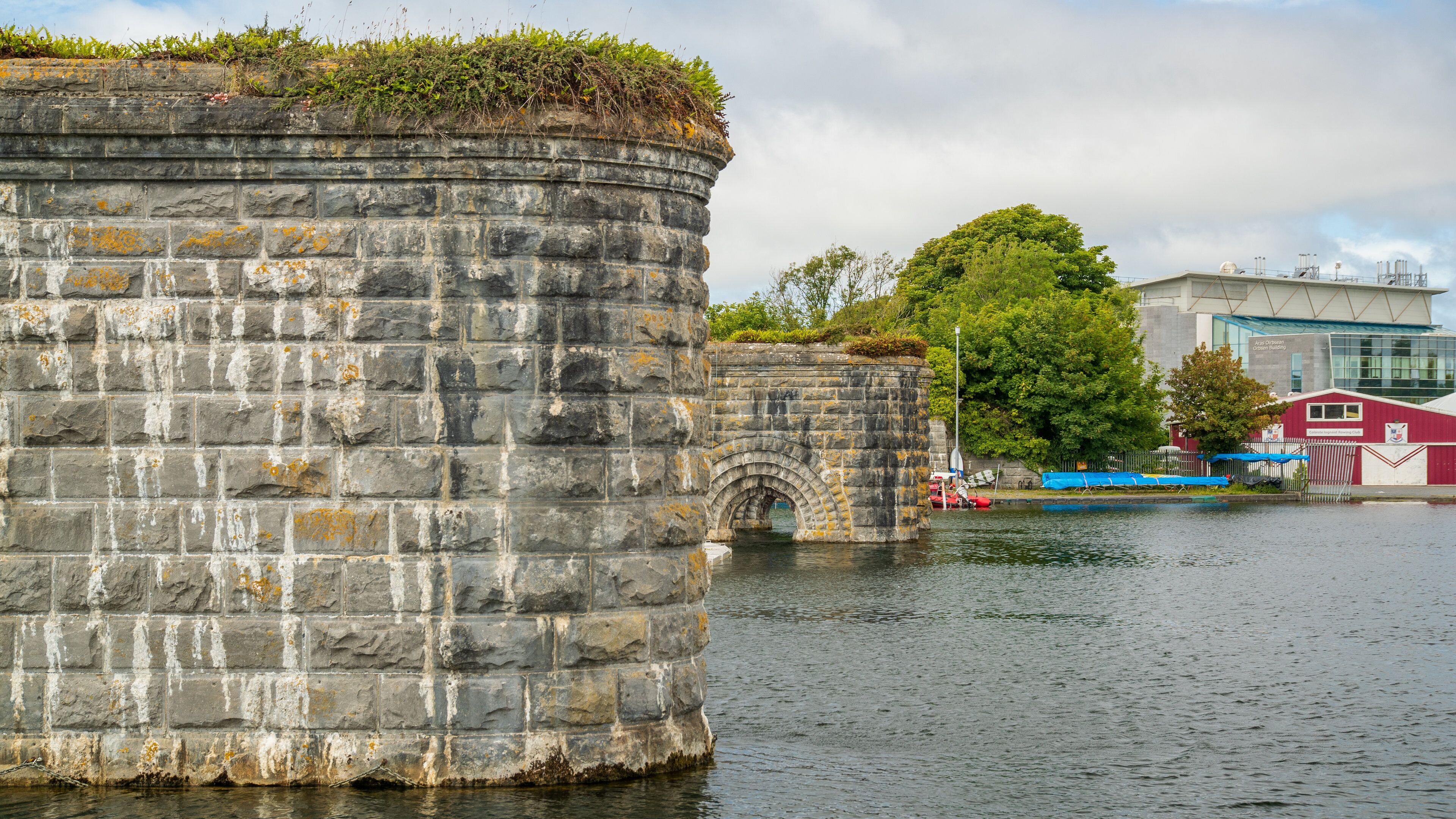 Riverside Walk which includes a bay or harbor