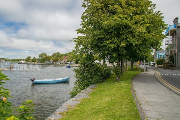 Riverside Walk which includes a bay or harbor
