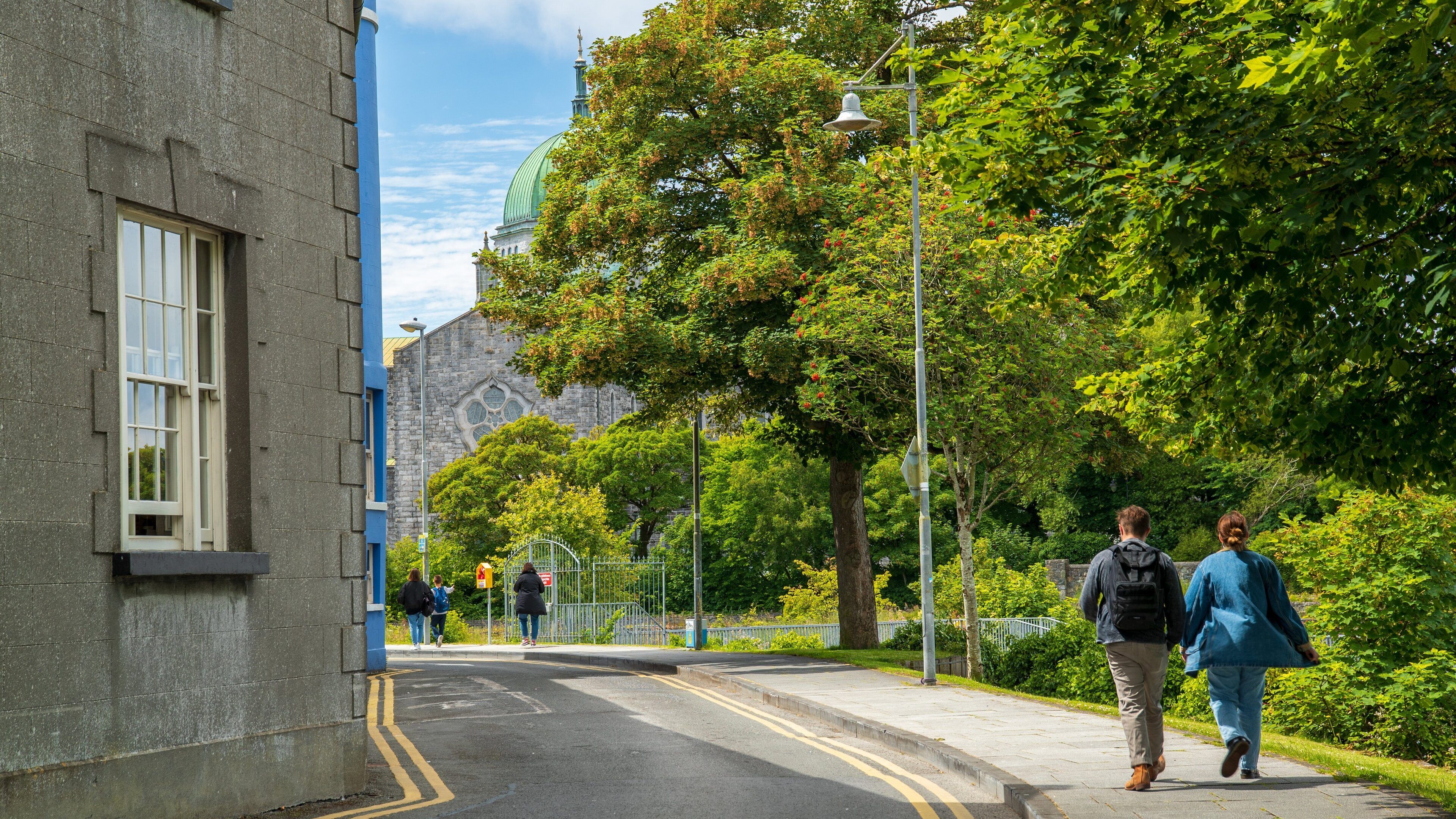 Riverside Walk featuring street scenes as well as a couple