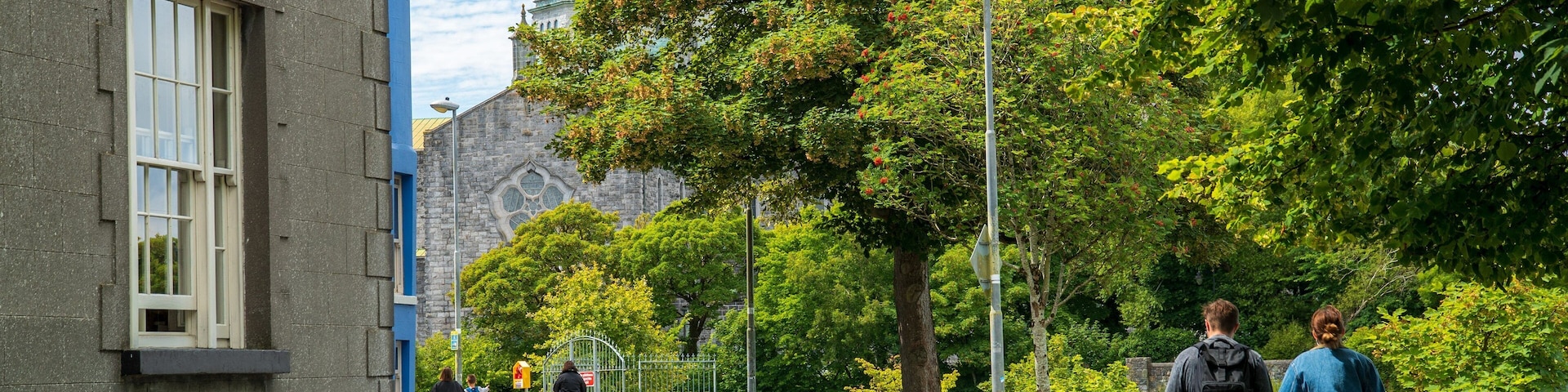 Riverside Walk featuring street scenes as well as a couple
