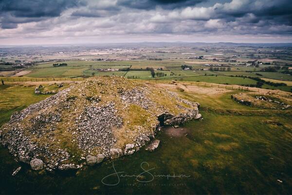 Loughcrew is near Oldcastle, County Meath, Ireland. Loughcrew is a site of considerable historical importance in Ireland. It is the site of megalithic burial grounds dating back to approximately 3500 and 3300 BC, situated near the summit of Sliabh na Caillí and on surrounding hills and valleys. Passage tombs on the site are aligned with the Equinox sunrise.
