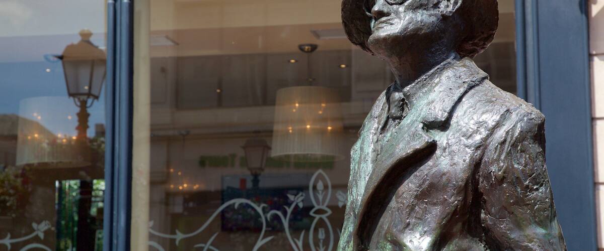 James Joyce Statue which includes a statue or sculpture, heritage elements and a monument