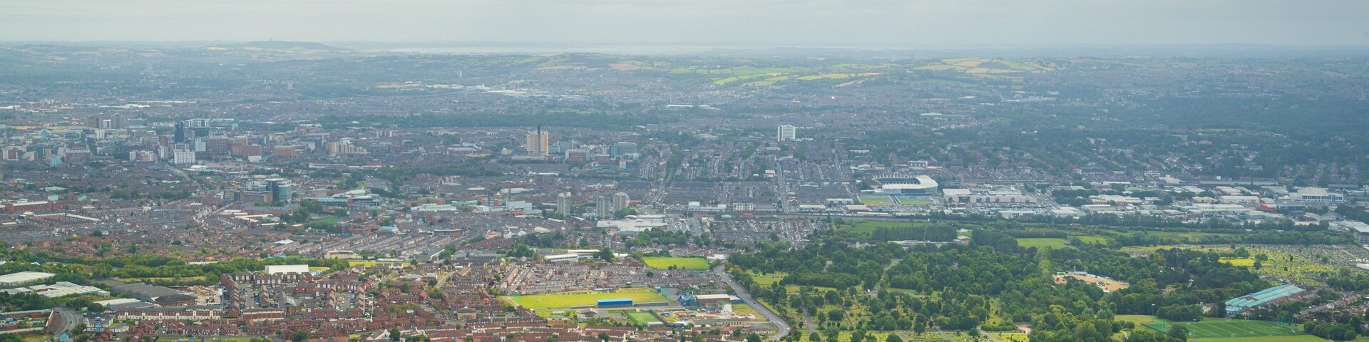 Black Mountain showing a city and landscape views