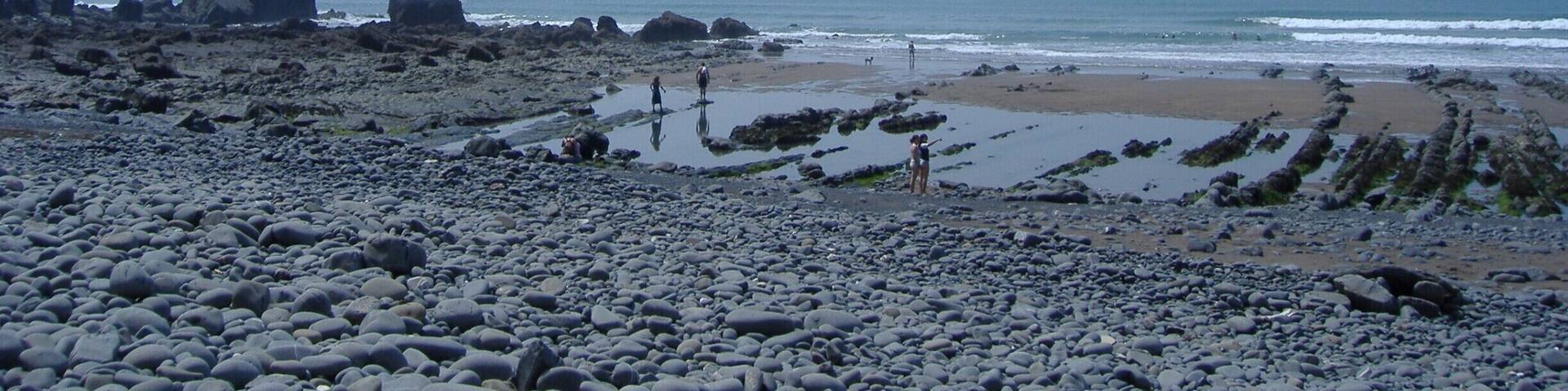 A hidden Devonshire gem, secluded beach off the beaten track - literally, access is via a steep, narrow coastal road. It's a popular spot with the locals that hasn't yet been discovered by the tourists.