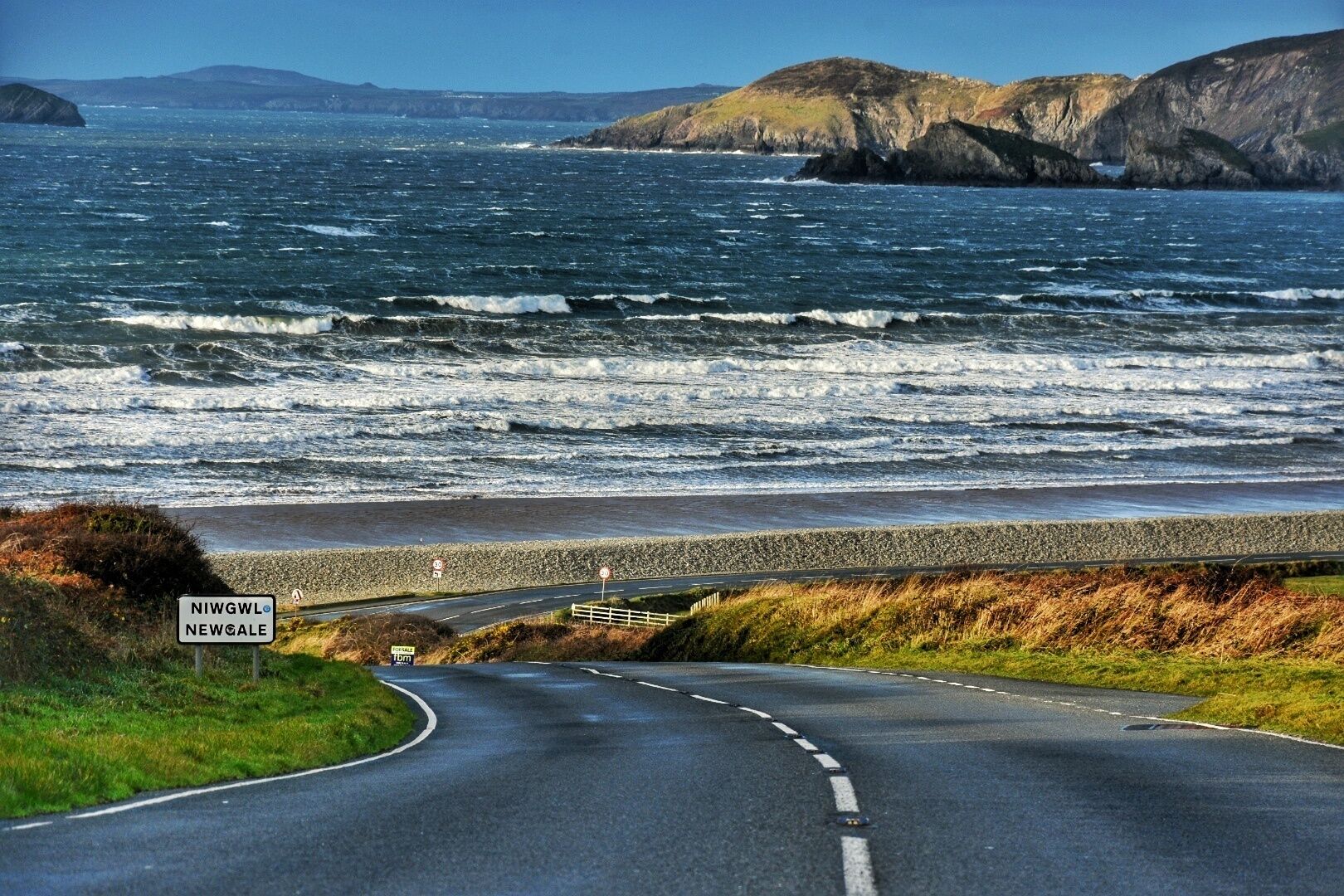 For me one of the most beautiful spots in Pembrokeshire . Situated between haverfordwest and st davids . The view as you come over the brow of the hill is jaw dropping very easy access to beach cafe pub and campsite literally yards from the sea . Popular with surfers .
#perspective