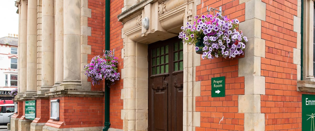 Emmanuel Christian Centre - Assemblies of God featuring flowers and heritage elements