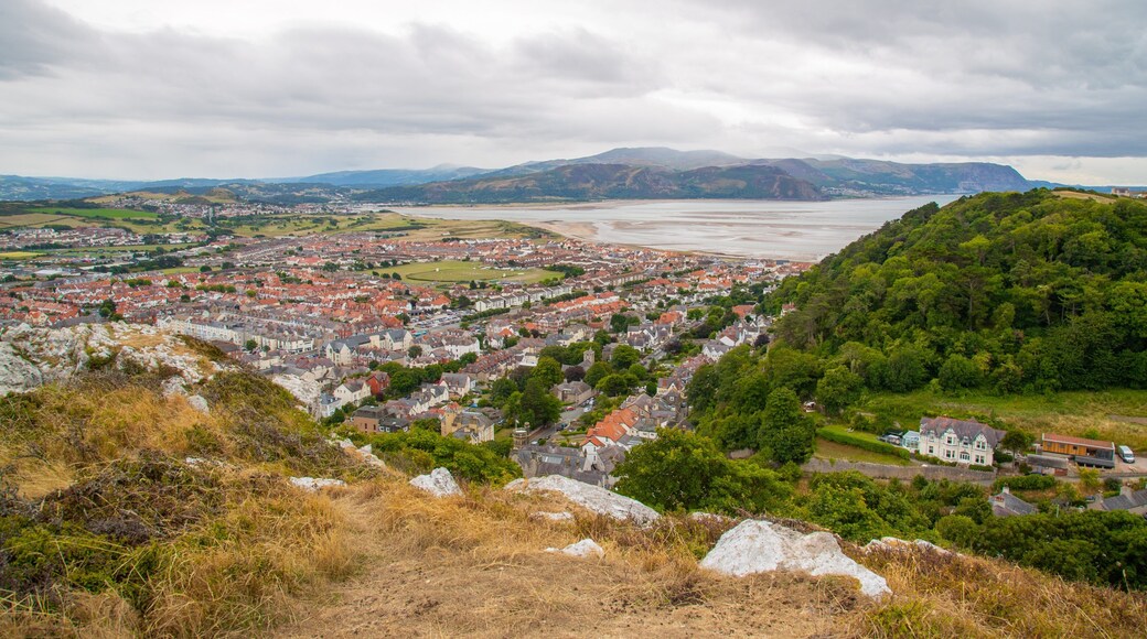 Pen-y-Dinas Hillfort featuring a coastal town, landscape views and general coastal views
