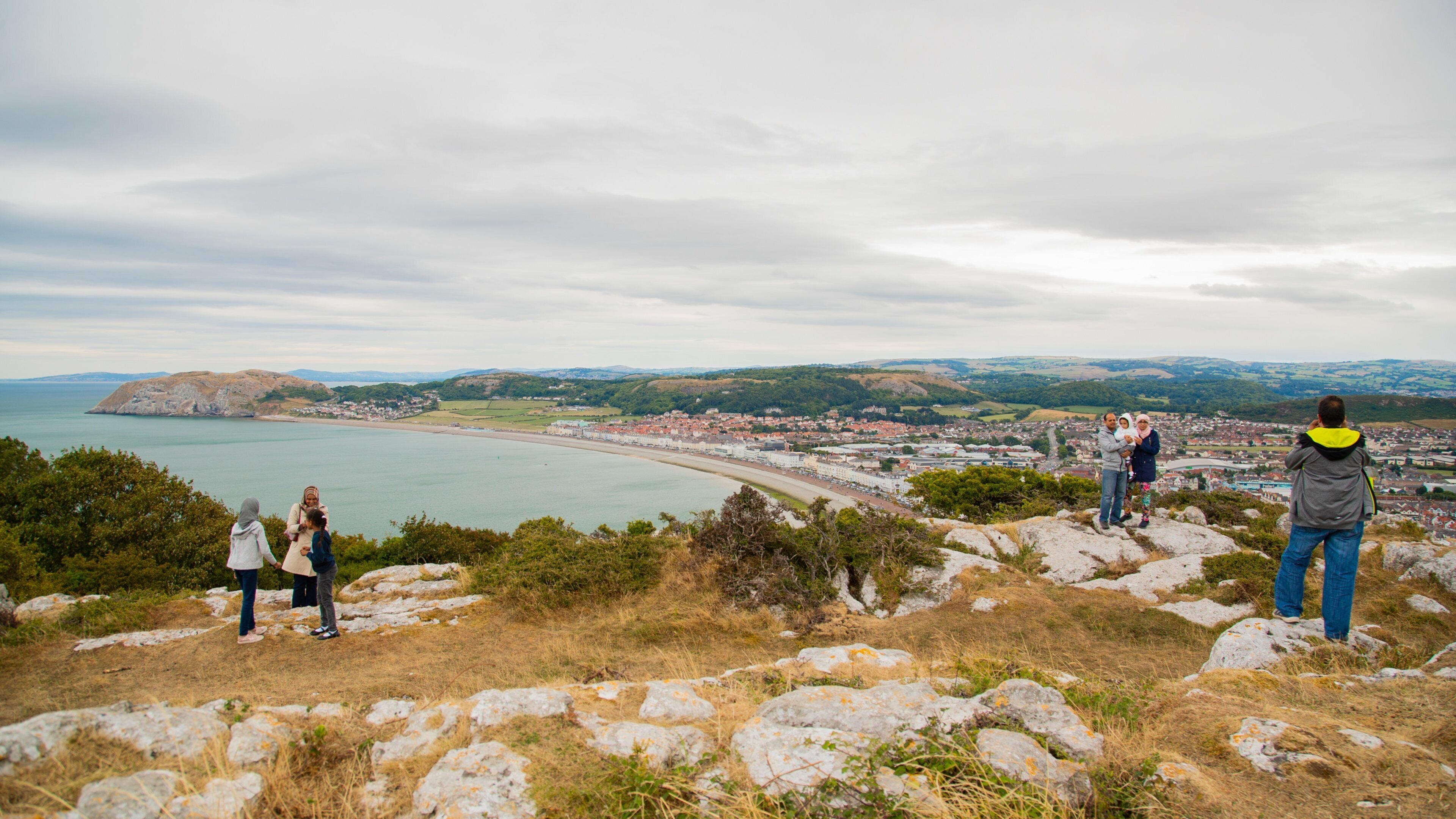 Pen-y-Dinas Hillfort showing general coastal views, a coastal town and views