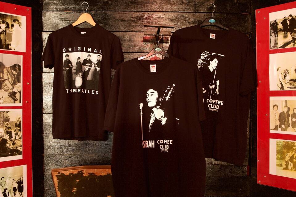 Three t-shirts with Beatles and coffee club Liverpool designs.