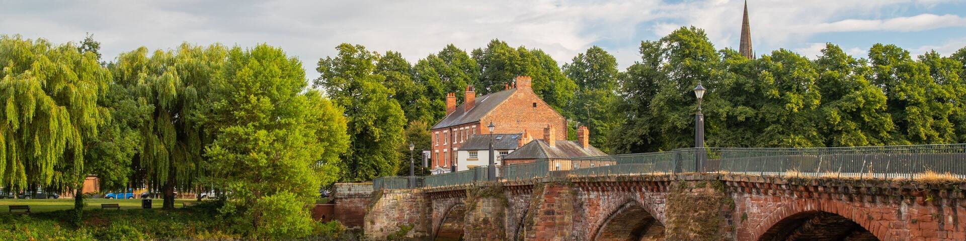 Chester featuring a river or creek and a bridge
