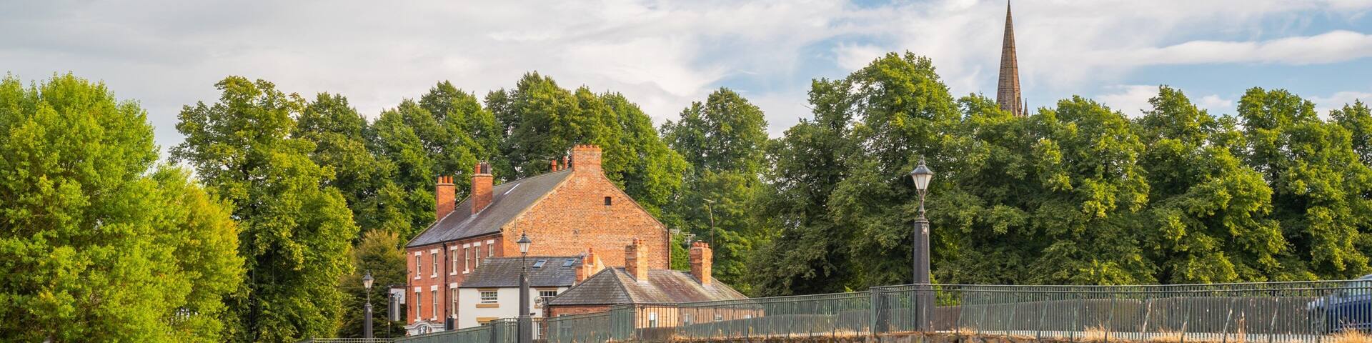 River Dee featuring a river or creek and a bridge