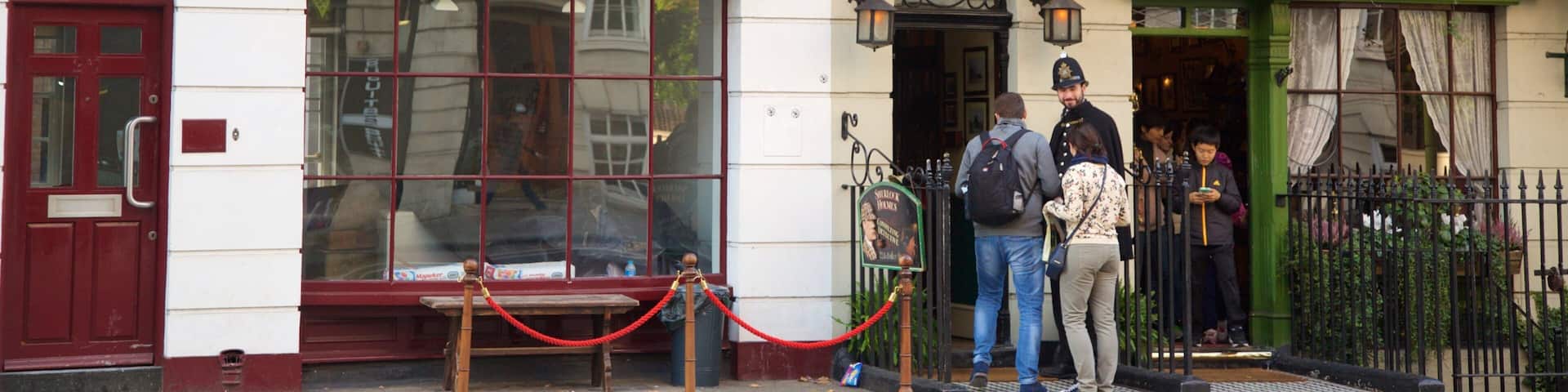 Sherlock Holmes Museum showing signage as well as a small group of people