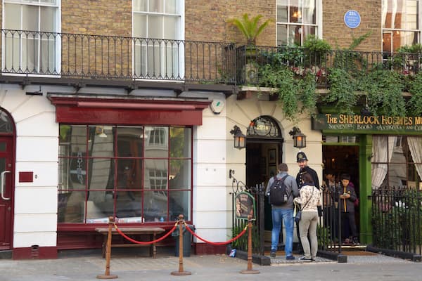 Sherlock Holmes Museum showing signage as well as a small group of people