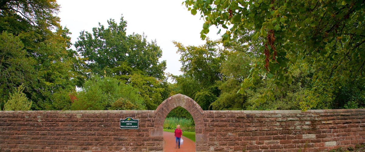 Grappenhall Heys Walled Garden showing heritage elements and a garden as well as an individual femail