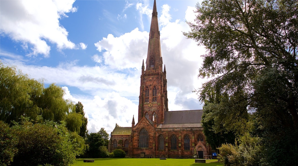 Warrington Parish Church featuring a park and heritage architecture