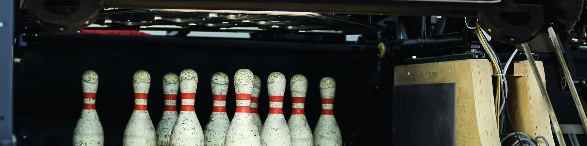 Pins at the end of a bowling alley,Skittles for bowling,bowling game; Shutterstock ID 609787733; Purchase Order: -