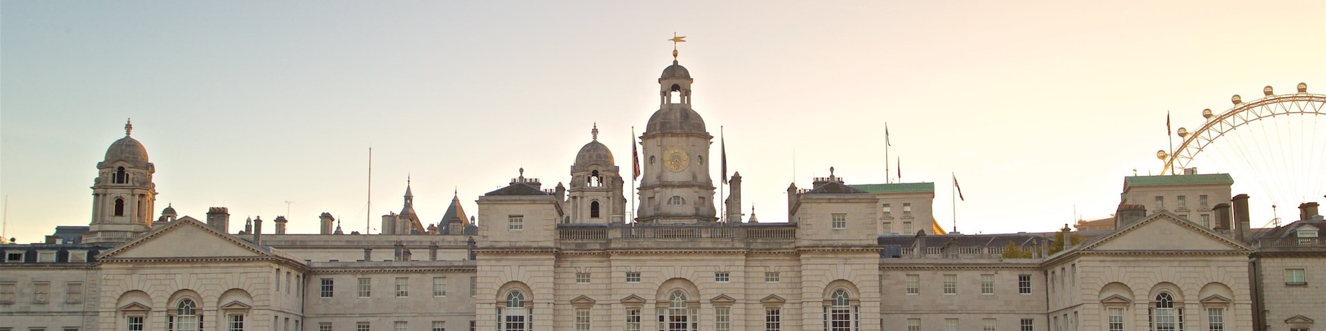 The Household Cavalry Museum which includes a sunset, a square or plaza and landscape views
