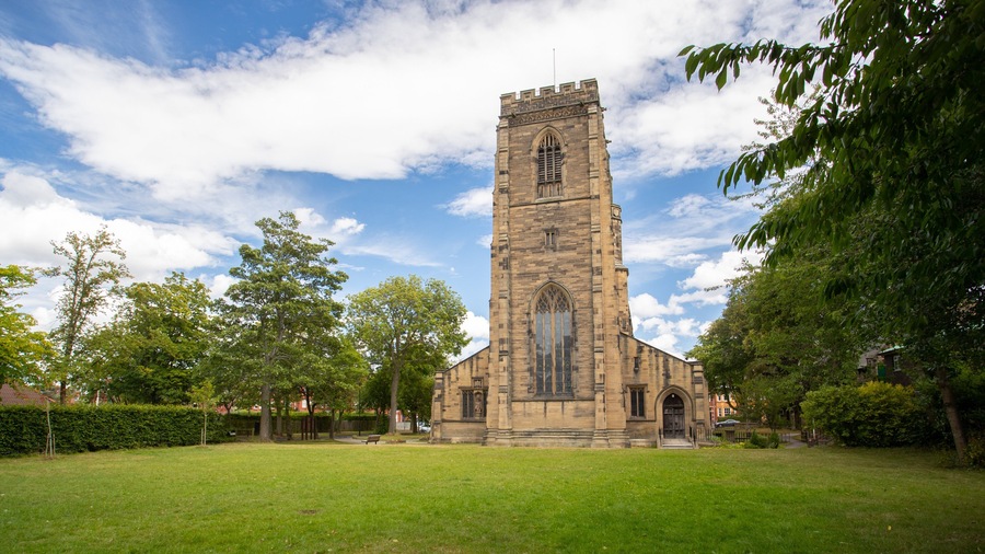 All Saints Church featuring heritage architecture and a church or cathedral