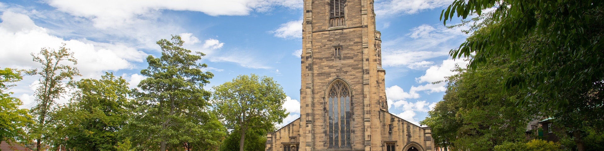 All Saints Church featuring heritage architecture and a church or cathedral