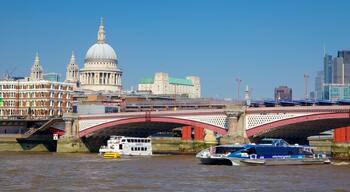 London showing a bridge, a river or creek and heritage architecture
