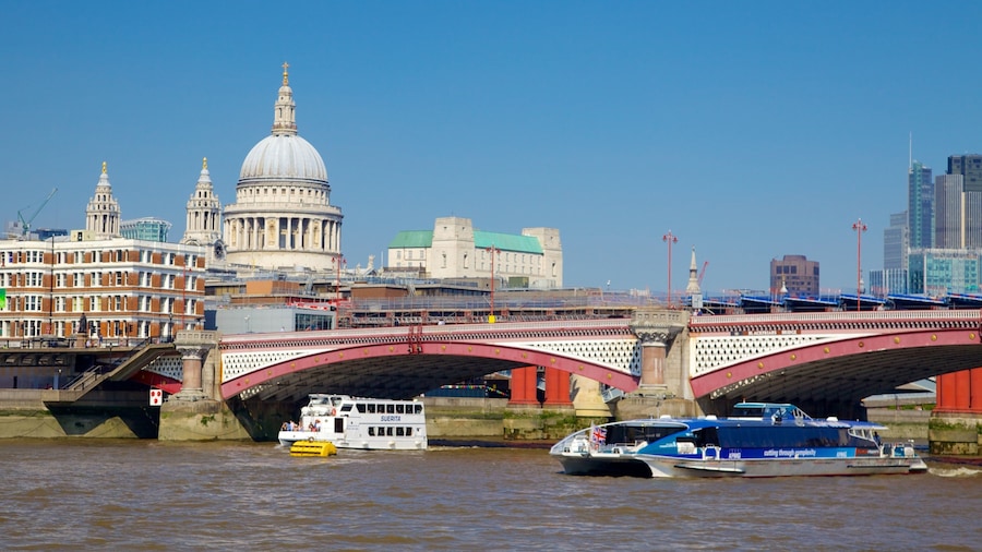 London showing a bridge, a river or creek and heritage architecture